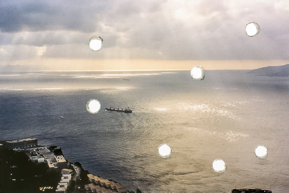 루노 라고마르시노, <Sea Grammar (detail)>, 2015, Slide projection loop, 80 perforated images in a slide projection carousel with timer, 1 original image (Mediterranean Sea), Variable projection size 